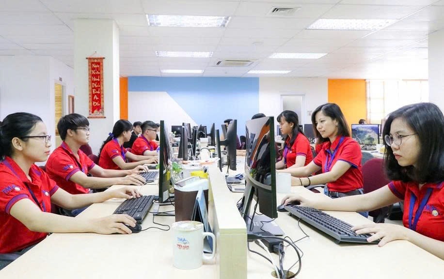 Nhân viên TMA Solutions làm việc trong lĩnh vực công nghệ. Ảnh tư liệu đăng tháng 1/2022. Báo điện tử chính phủ